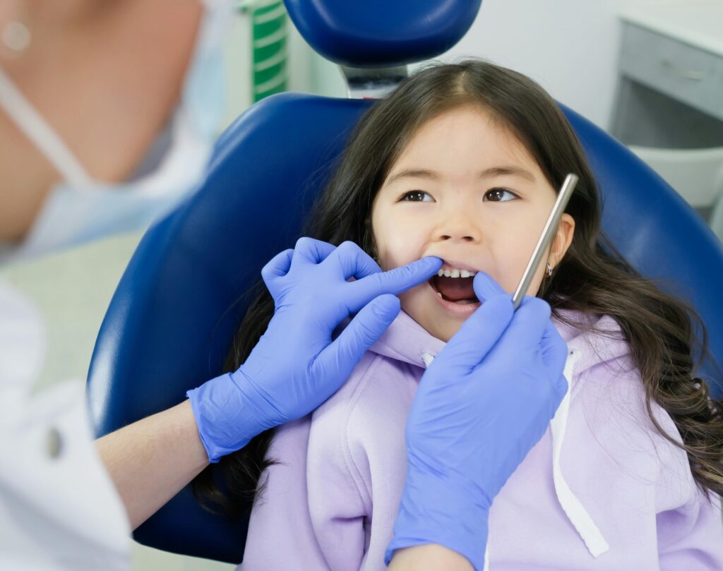Child wearing clear aligners for comfortable orthodontic care