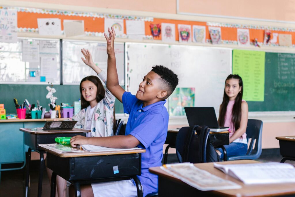 Kids in a classroom for back-to-school after getting braces in Plano, Texas with Bean Orthodontics